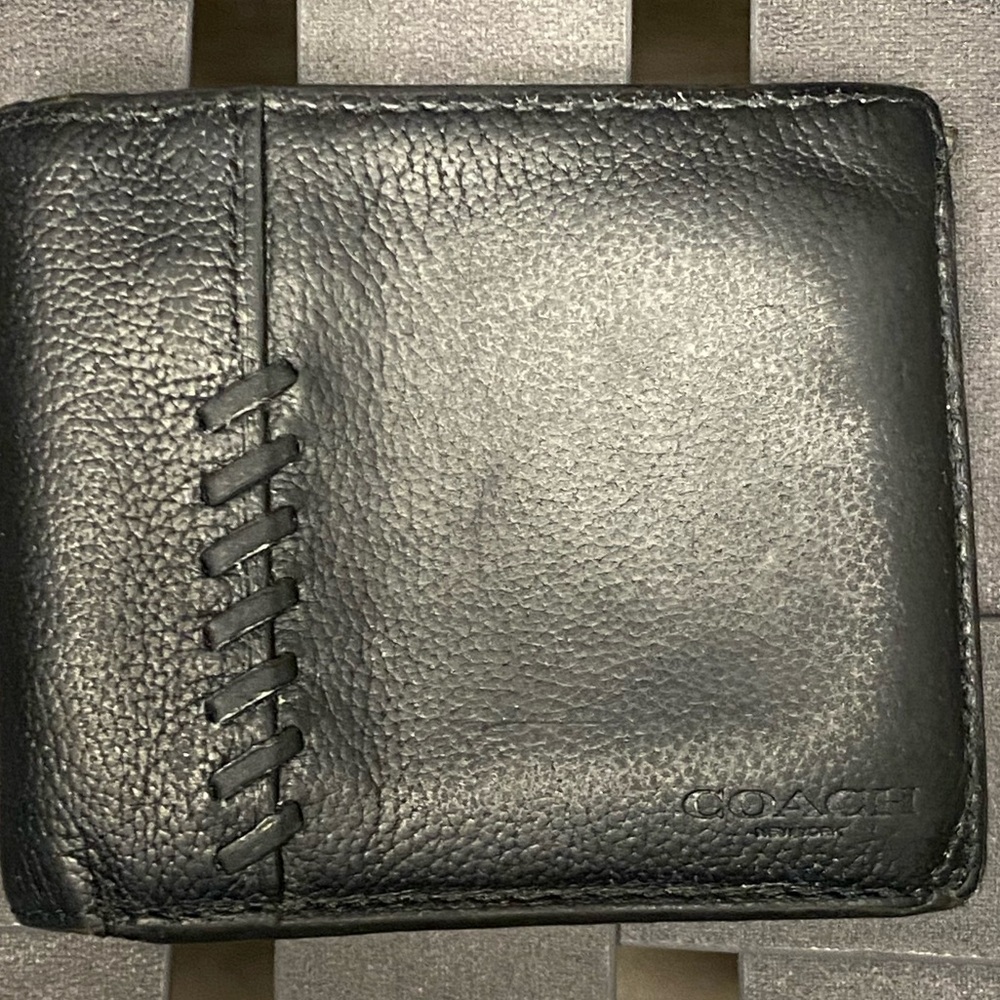 Coach Leather Men's Bifold Wallet. 
Six CC slots full length bill compartment.